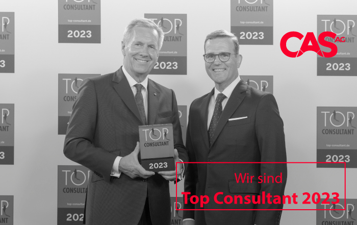 Christian Wulff Bundespräsident a. D. überreicht das Siegel Top Consultant an Olaf Pagel, Mitglied des Vorstandes CAS AG
